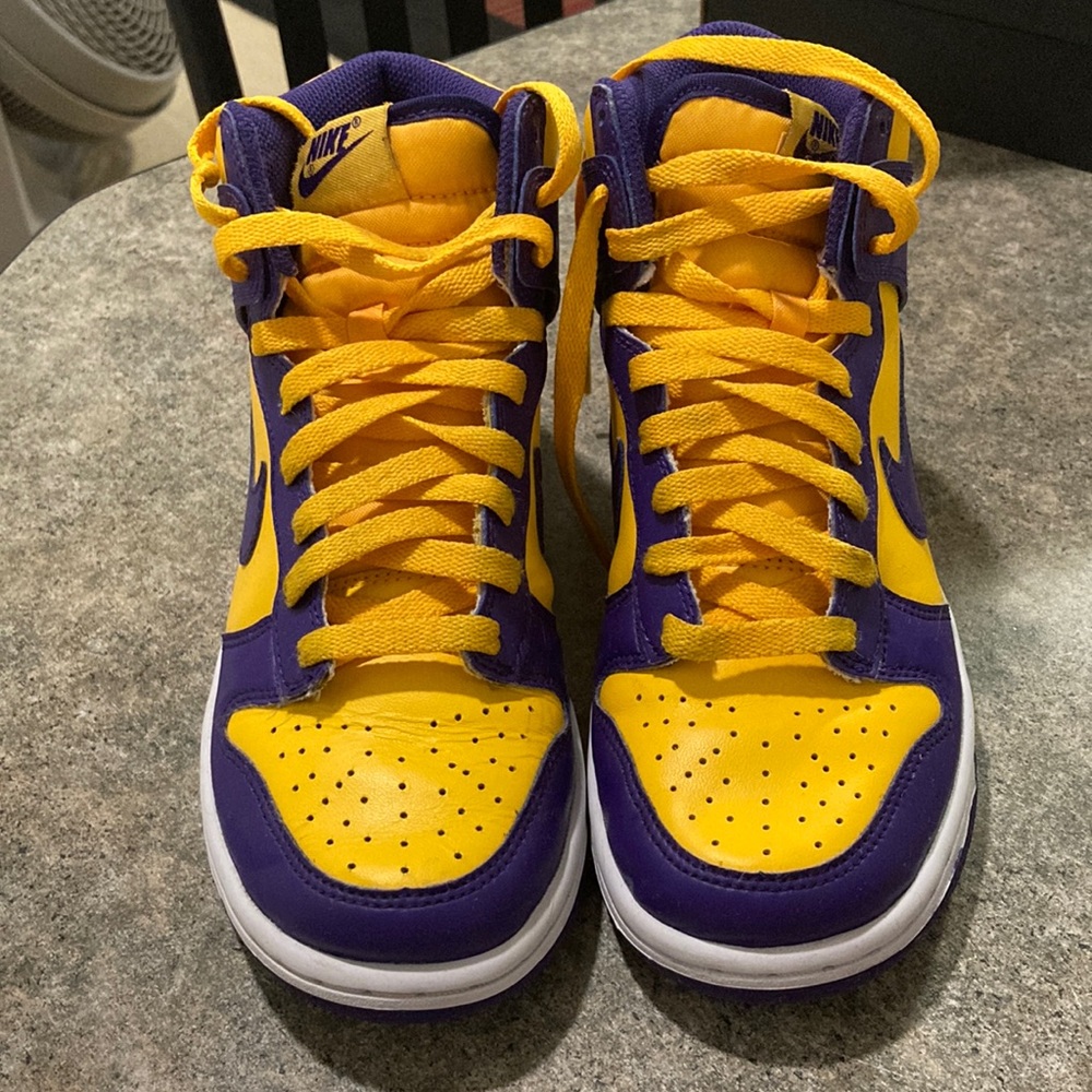 Nike dunks yellow and purple used by my son !! Still in great condition…